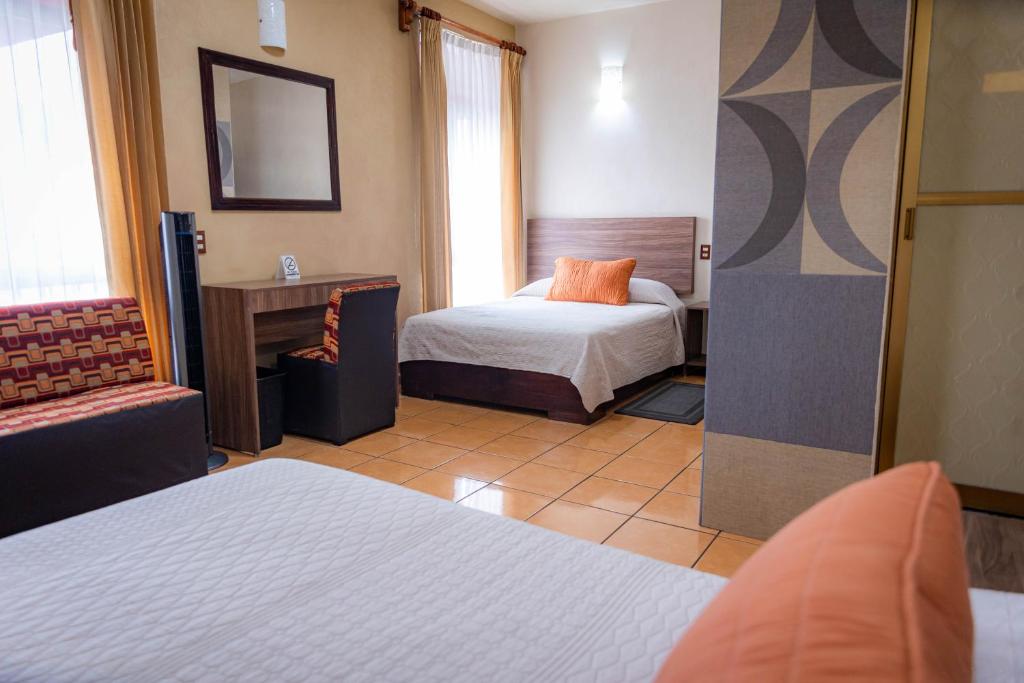 Twin Room with two full beds at Hotel Estefania